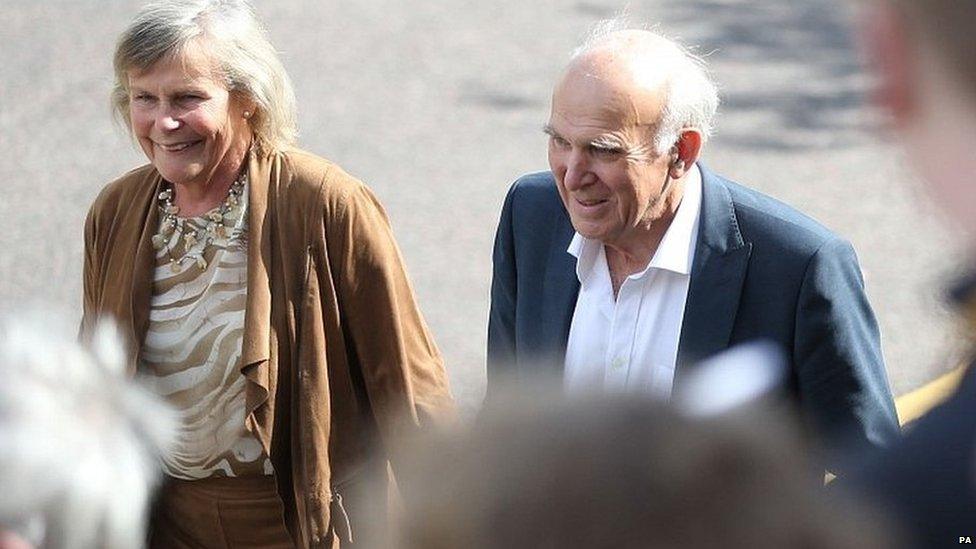 Sir Vince Cable arrives at the party's conference with his wife Rachel