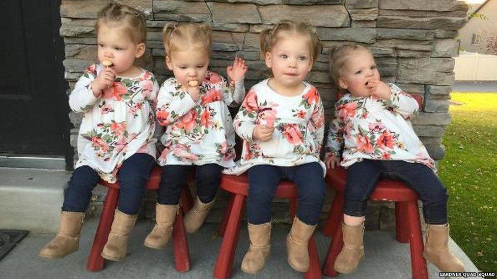 Ashley Gardner's quadruplet girls sit on bench