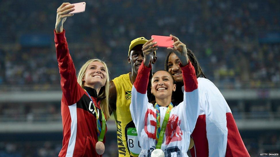 Bolt poses with heptathlon medalists