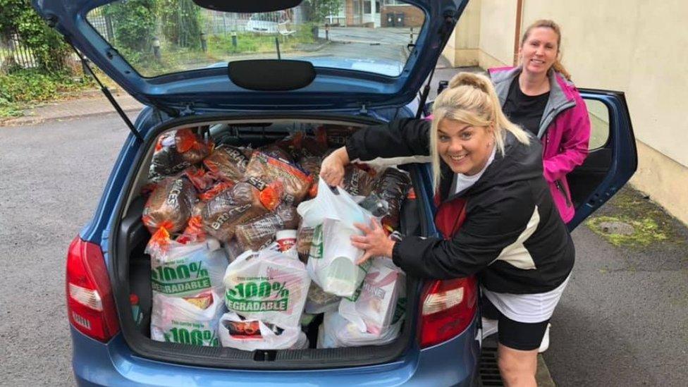 Volunteers delivering food