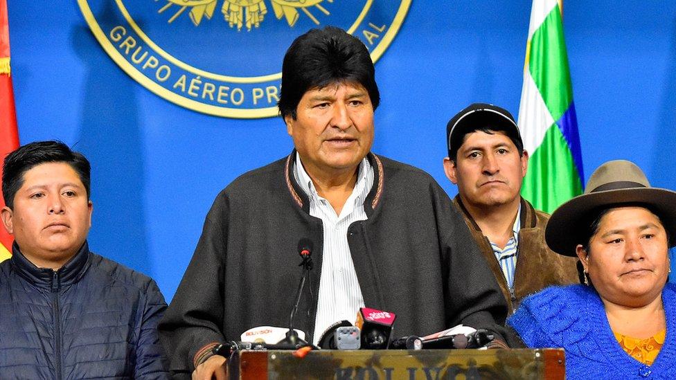 Evo Morales speaking at a podium in November 2019