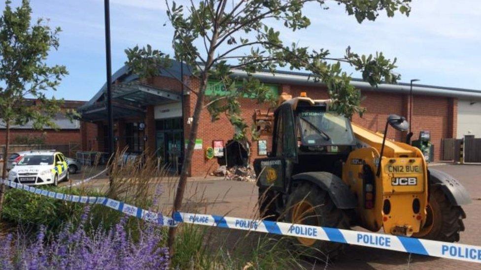 Hole left by thieves in Co-op