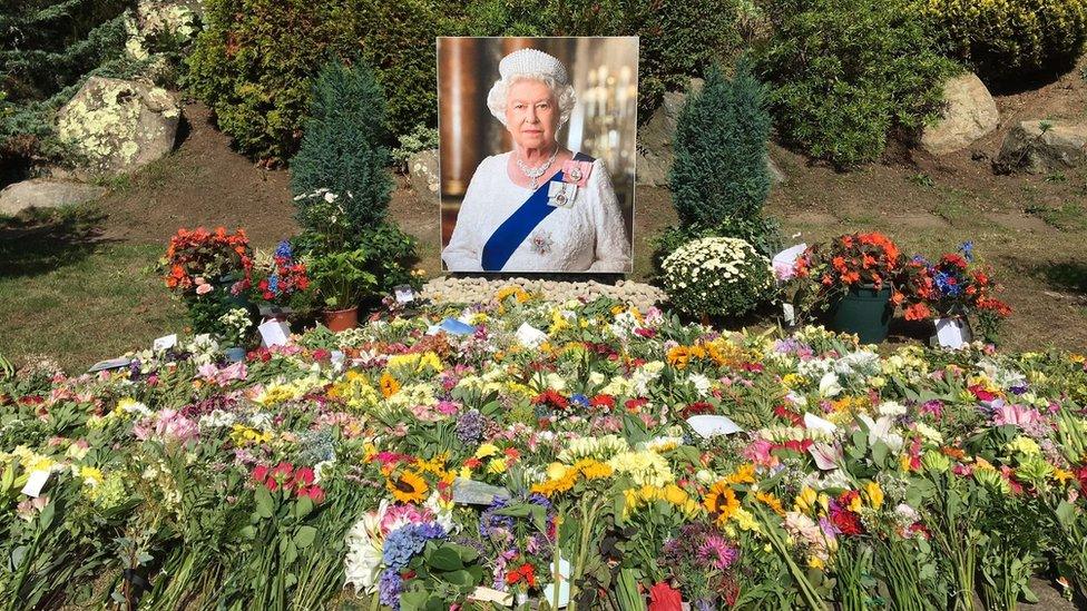 Flowers mourning the Queen at Guernsey's sunken garden