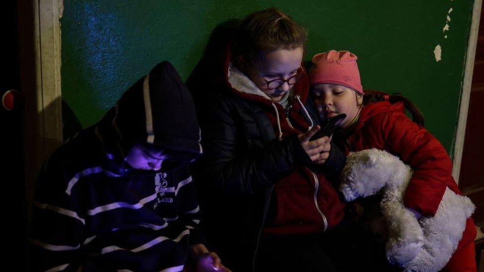 Children play inside a bunker in Severodonetsk, in eastern Ukraine