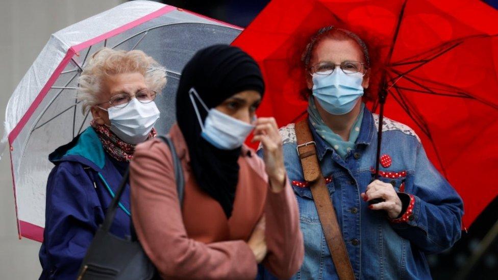 People in masks in Blackburn