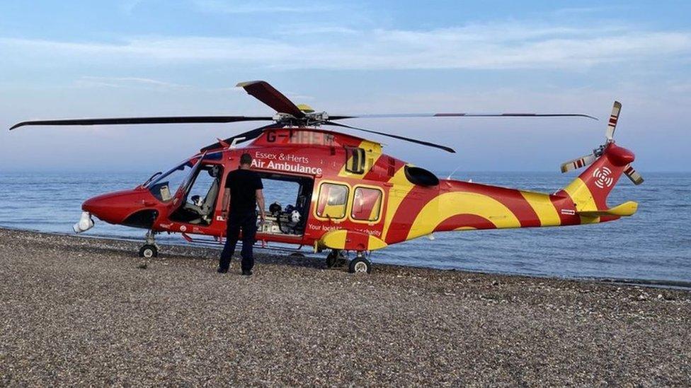 Air ambulance helicopter on beach