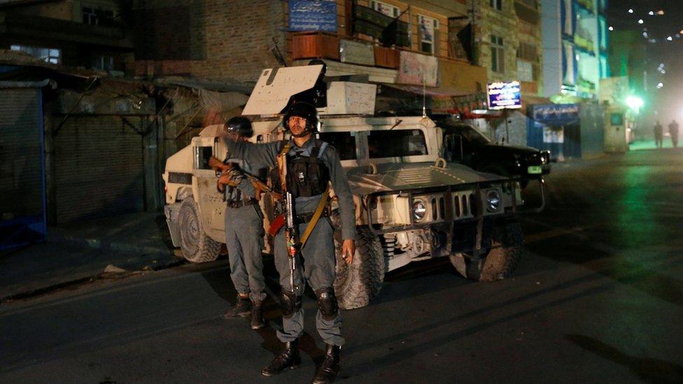 Policeman stands guard near scene of attack - 11 October