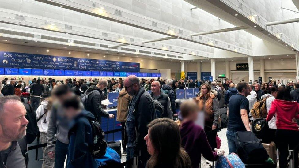 People queuing at the airport