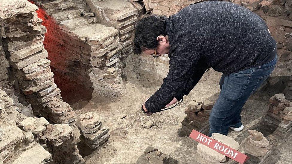 Heritage photographer, Antonio Reis, taking photographs of Welwyn Roman Baths