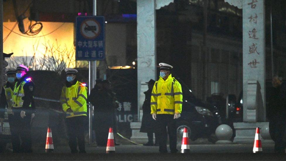 Chinese police standing outside school in Henan province