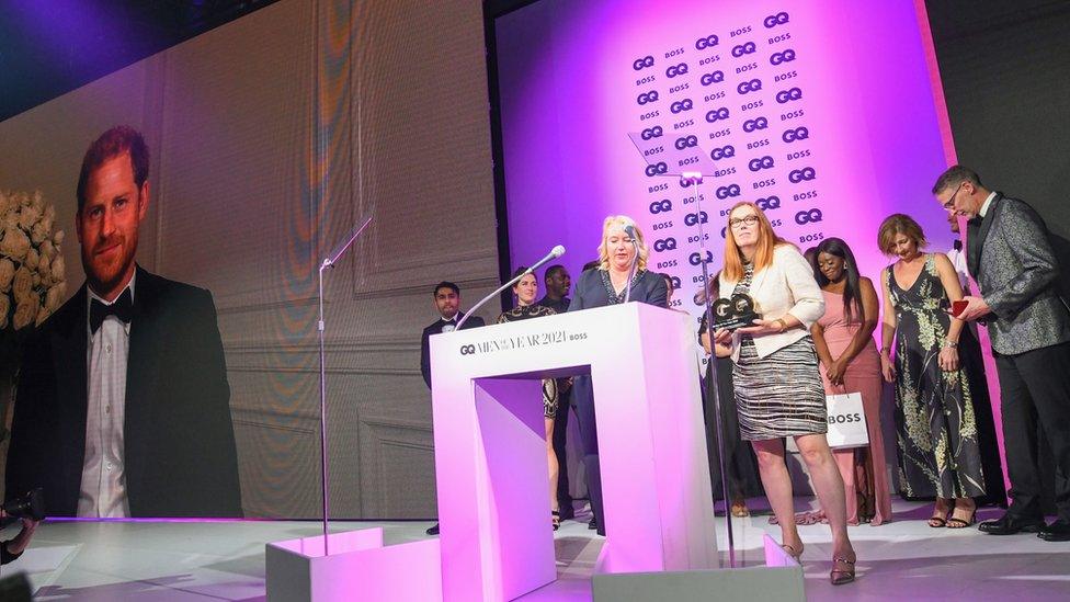 Prince Harry presenting an award to Prof Dame Sarah Gilbert and Prof Catherine Green