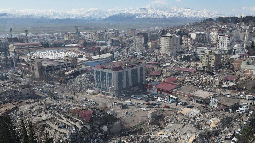 Collapsed buildings in the aftermath of a powerful earthquake in the centre of Kahramanmaras