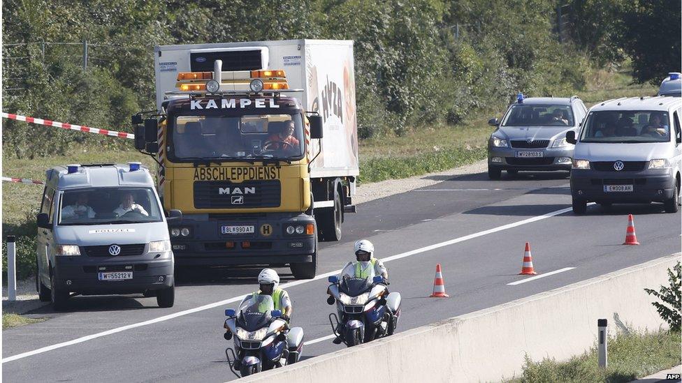 Truck is towed away (27 Aug 2015)