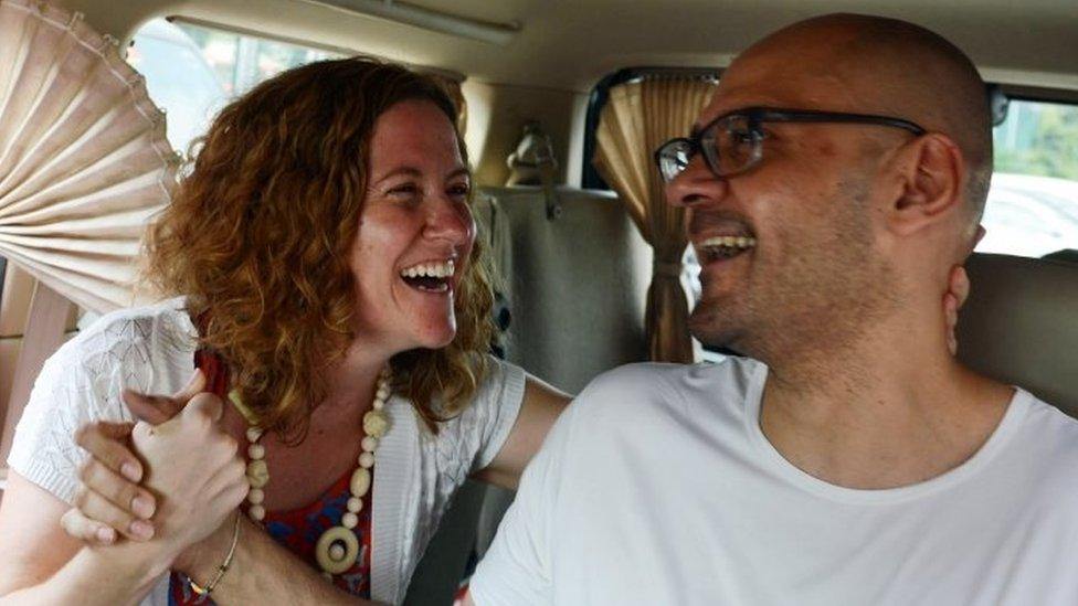 British-Canadian teacher Neil Bantleman (R) and wife Tracy Bantleman (left) after his release from Jakarta's Cipinang prison in August