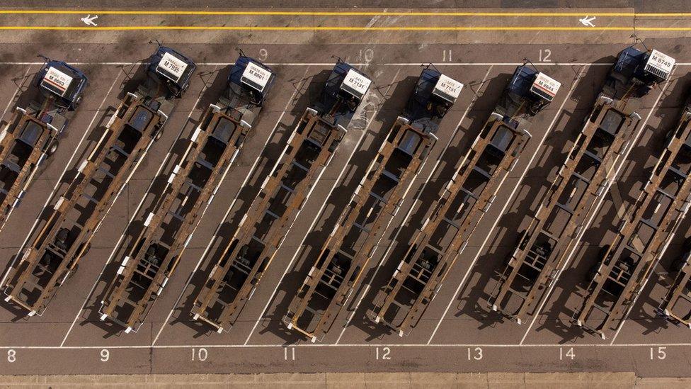 Shipping container transporters sit in the Port of Felixstowe in Suffolk, following a strike by members of the Unite union at Britain's biggest and busiest container port