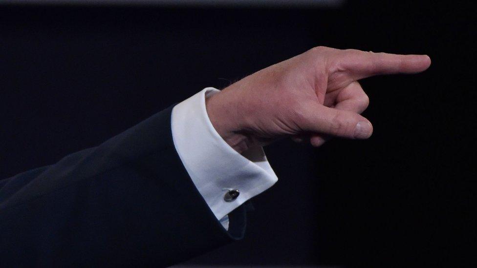 Republican presidential nominee Donald Trump points while speaking during the third and final US presidential debate with Democratic nominee Hillary Clinton at the Thomas ^ Mack Center on the campus of the University of Las Vegas in Las Vegas, Nevada on October 19, 2016