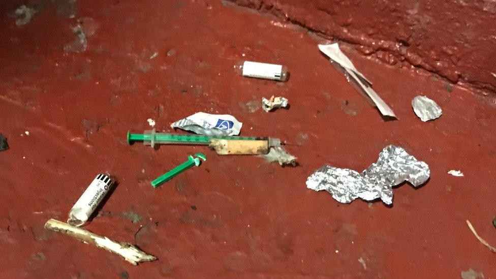 Needles left outside trader Terry Milligan's storage unit in Lisle Street