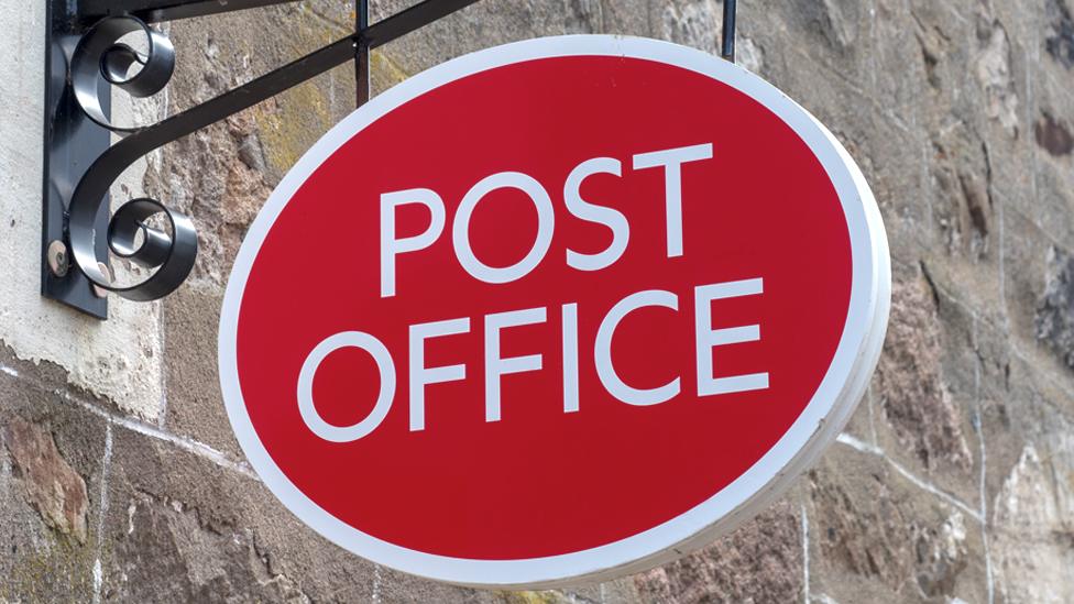 Stock image of a Post Office sign