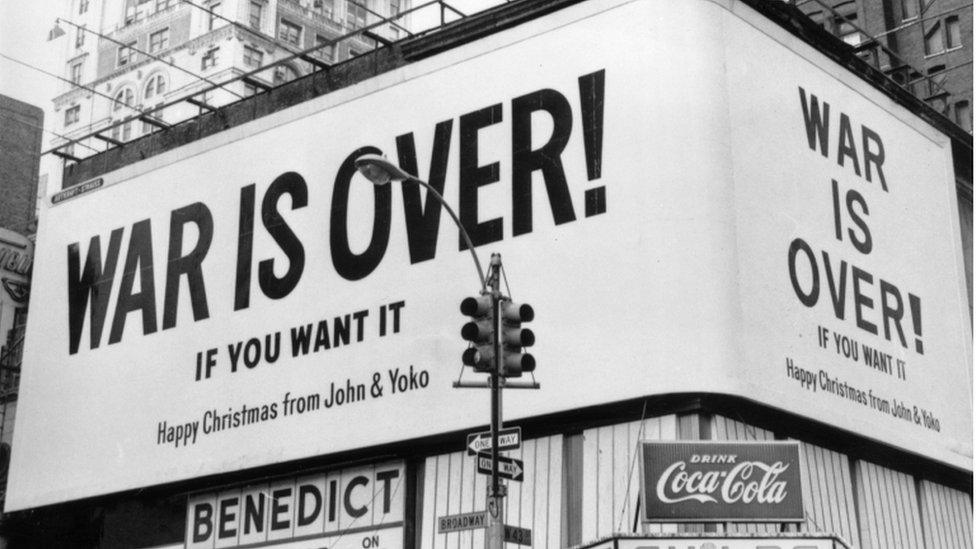 Christmas-peace-message reading-War-Is-Over-from-John-Lennon-and-Yoko-Ono-on-a-billboard-in-New-York-City.