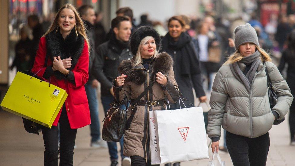 Women with shopping bags