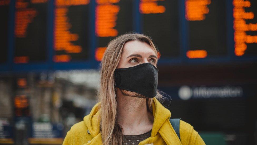 Woman in train station