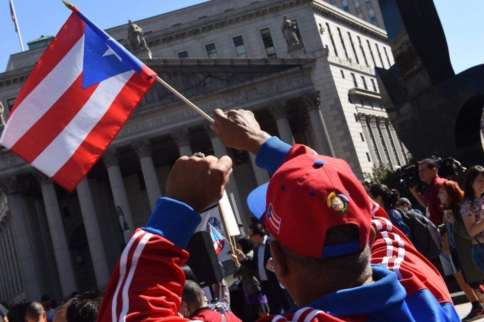 Puerto Ricans in New York rally for more aid for the Caribbean island territory