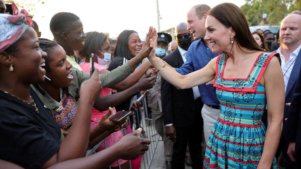 The Duke and Duchess of Cambridge greet people in Trench Town, Jamaica