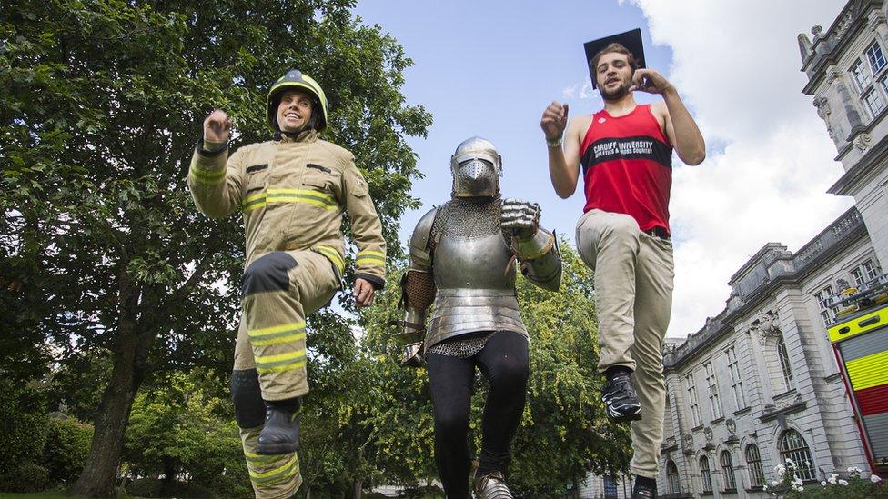 A photo of Firefighter Kevin Summerhayes, Sir Runalot, and Alec Care