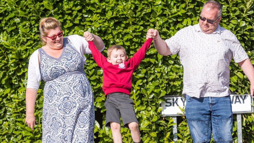 Alec Carpenter with his parents Nicola and Glen