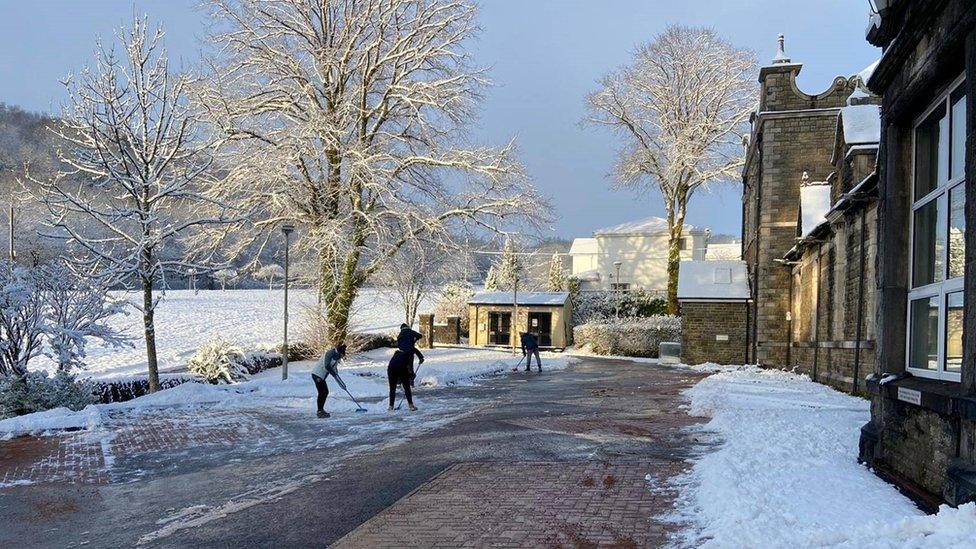 volunteers clear pathways in Maesteg