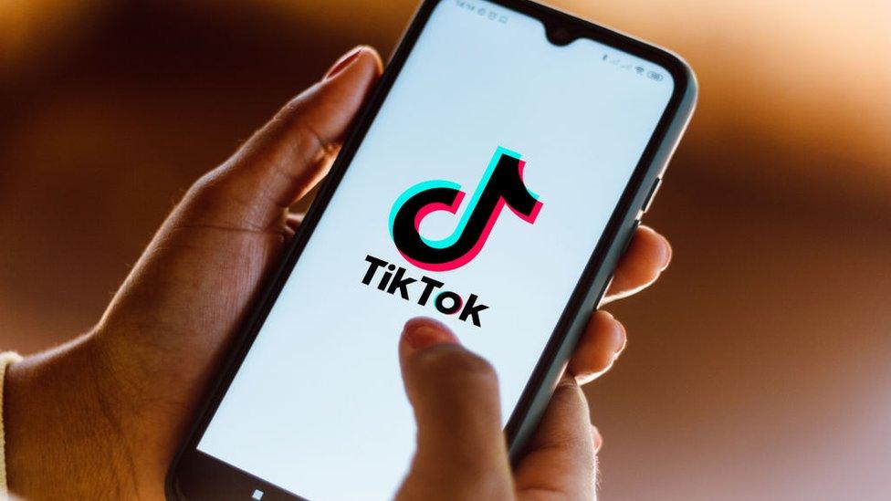 person-using-tiktok-app.