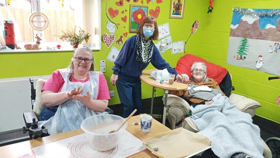 People at Centre 81 taking part in cooking festive treats