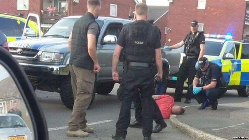 Still of mobile phone footage showing Dan Sullivan's arrest