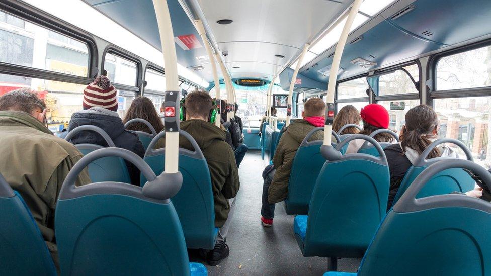 Passengers on a London bus