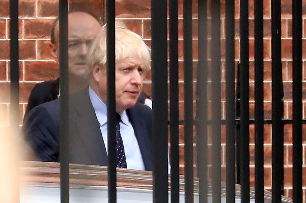 Prime Minister Boris Johnson and his special advisor Dominic Cummings leave Downing Street on September 3, 2019, before heading to the Houses of Parliament.