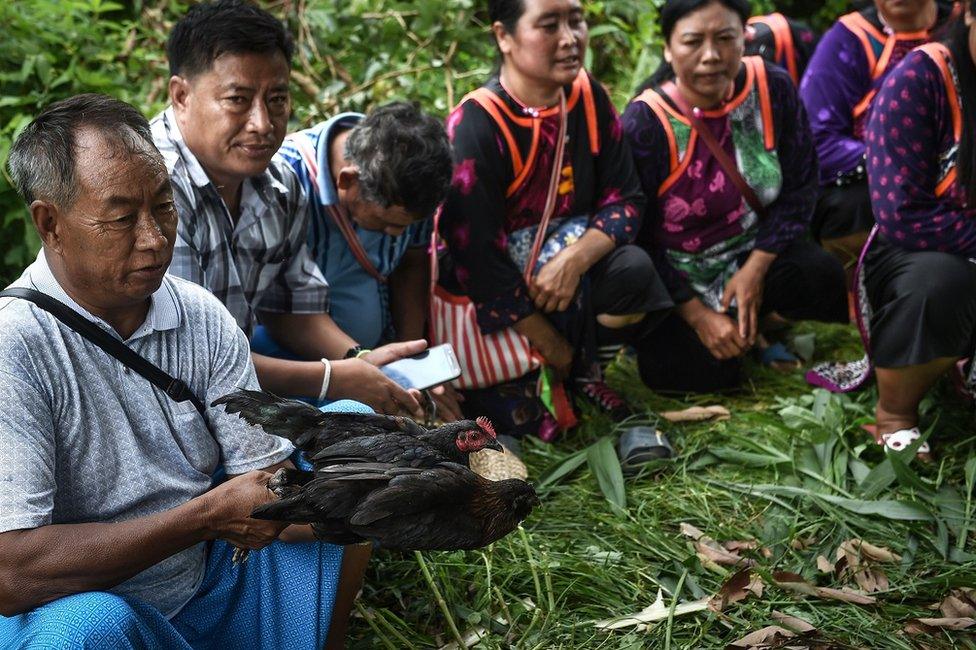 Ethnic Lisu tribespeople hold a ritual in Khun Nam Nang Non Forest Park