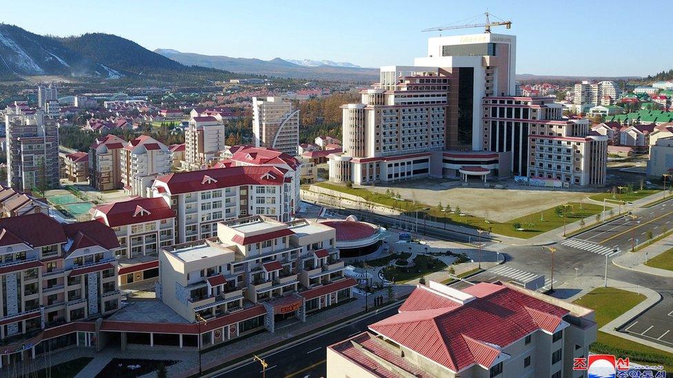 Buildings and construction sites are seen in Samjiyon County,