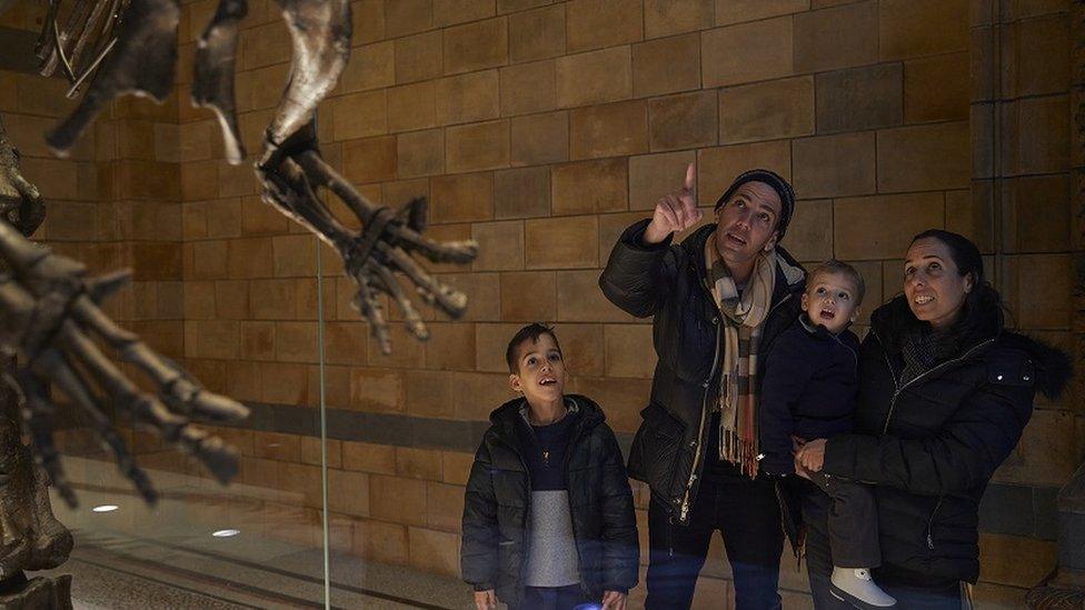 A family visiting the National History Museum