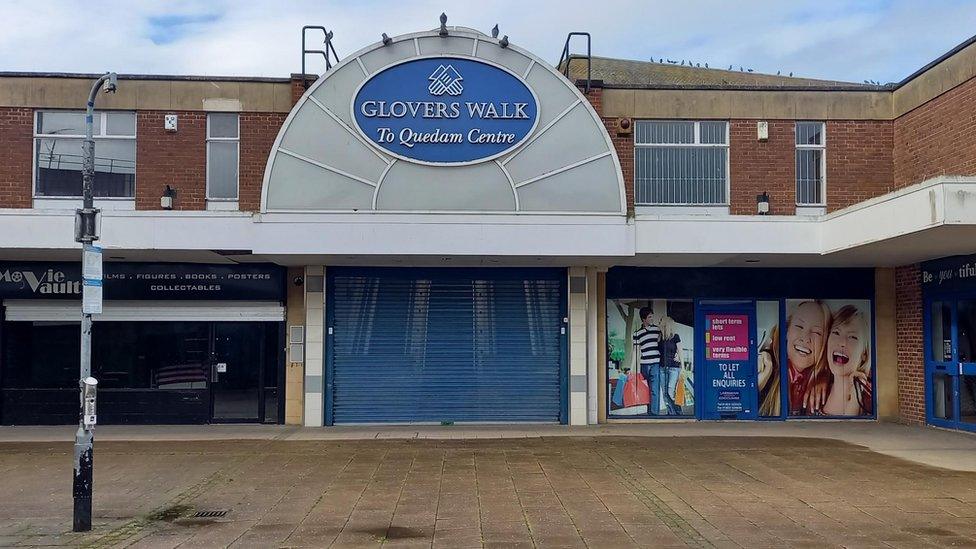 Shopping centre in Yeovil with shutters down and shops closed