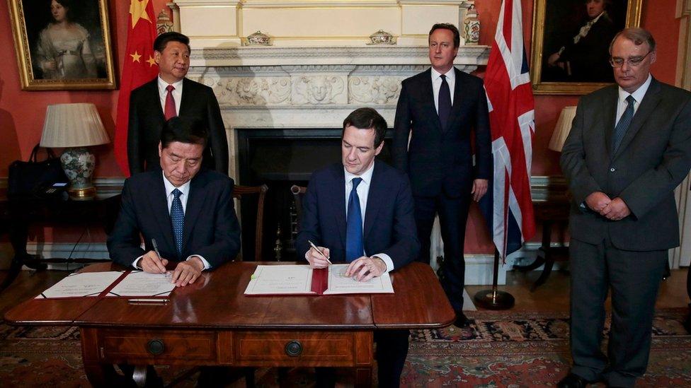 George Osborne signs document