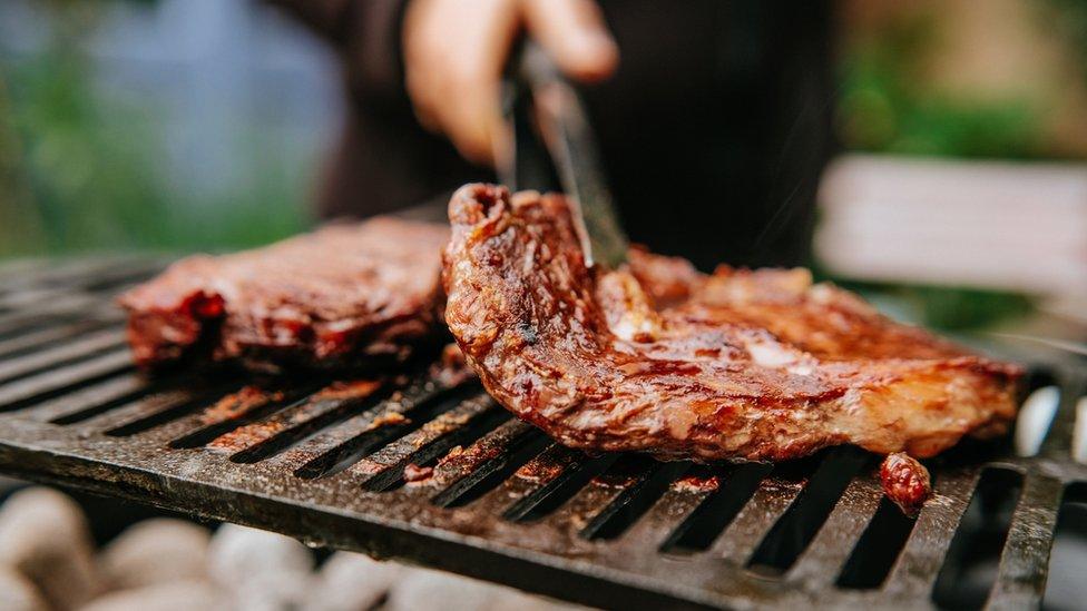 Steaks on a barbecue