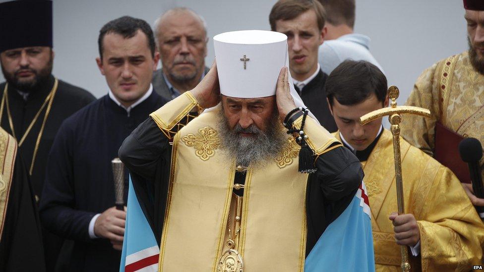 Metropolitan Onufriy (C), head of the Ukrainian Orthodox Church of Moscow Patriarchate