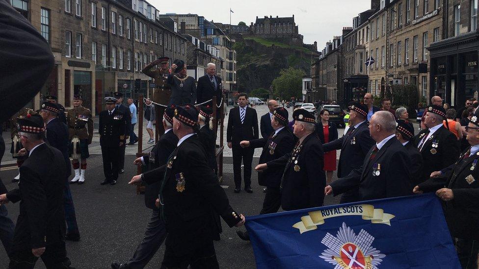 servicemen and women march through central Edinburgh for the annual Armed Forces Day