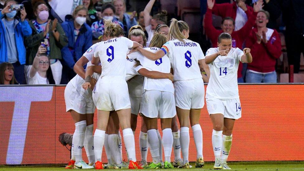 England players celebrate after team-mate Lucy Bronze scores their side's second goal of the game during the UEFA Women's Euro 2022 semi-final match at Bramall Lane, Sheffield