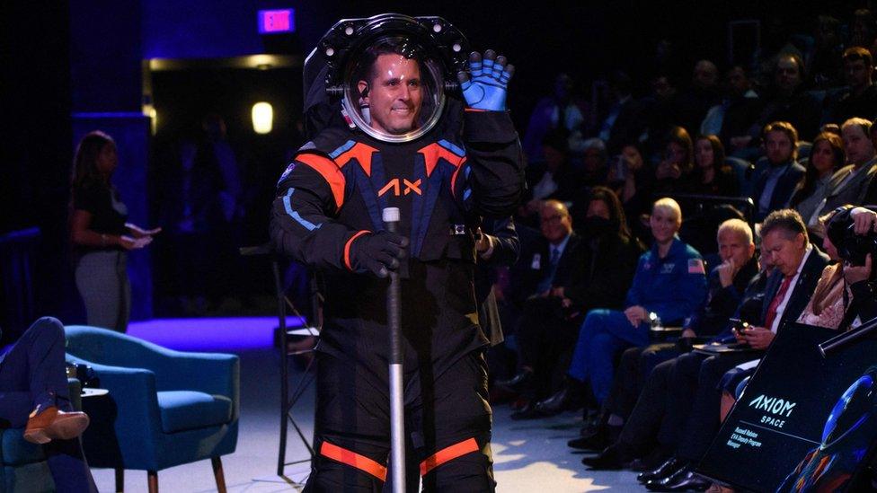 Chief Engineer Jim Stein wears the new spacesuit during the Axiom Space Artemis III Lunar Spacesuit event at Space Center Houston in Houston, Texas, on March 15, 2023. -