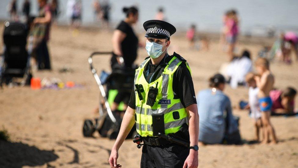 policeman on beach