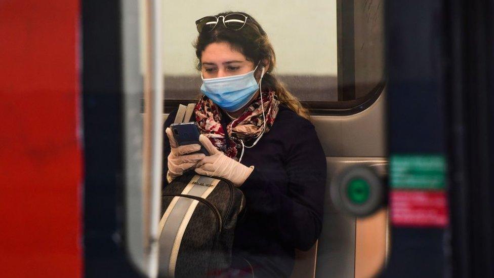 woman on phone on train