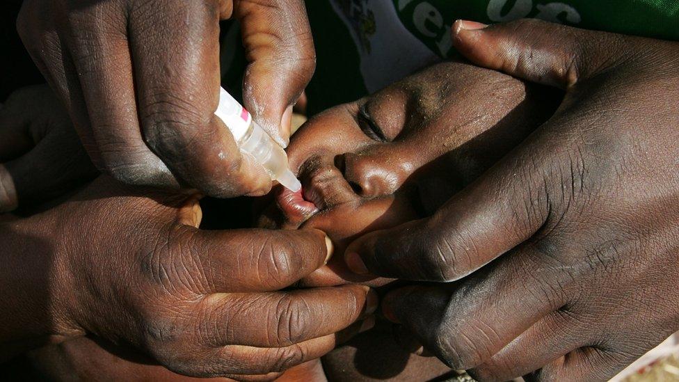Boy getting polio vaccine