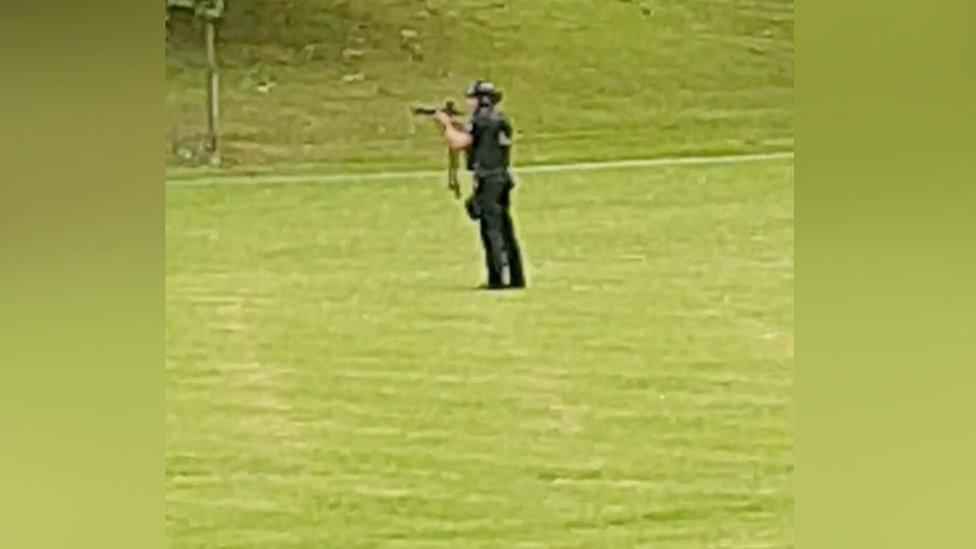 Armed police officer at Cwmdonkin Park