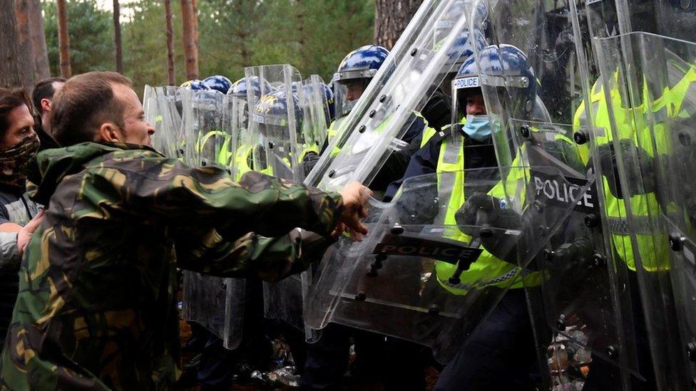 Police and revellers clash at the rave in Thetford Forest